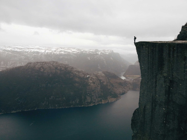 Atle Ronningen, MPA Shortlisted. Man standing on an edge of a cliff photo.